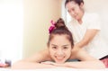 Cute Asian woman is smiling while taking spa Royalty Free Stock Photo