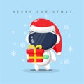 cute astronaut carrying a gift box on christmas day