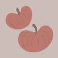 cute autumn orange pumpkins with brown roots on a beige background. the concept of autumn atmosphere and coziness