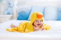 Cute baby after bath in yellow duck towel Royalty Free Stock Photo