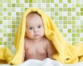 Cute baby in bathing towel