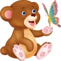 Cute baby bear cartoon playing with butterfly Royalty Free Stock Photo