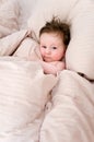 Cute baby in bed