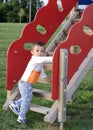 Cute baby boy on the climb stairs Royalty Free Stock Photo