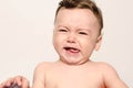 Cute baby boy crying. Royalty Free Stock Photo