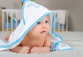 Cute baby boy in a hooded towel after bath Royalty Free Stock Photo