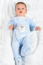 Cute baby boy is lying on the white blanket Royalty Free Stock Photo