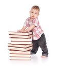 Cute baby boy with many books isolated on white Royalty Free Stock Photo