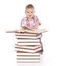 Cute baby boy with many books isolated on white Royalty Free Stock Photo