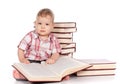 Cute baby boy with many books isolated on white Royalty Free Stock Photo