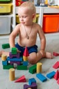 Cute baby boy playing with building blocks Royalty Free Stock Photo