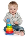 Cute baby boy is playing with toys Royalty Free Stock Photo