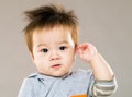 Cute baby boy salute Royalty Free Stock Photo