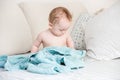 Cute baby boy sitting on towel after having bath Royalty Free Stock Photo