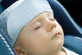 Cute baby boy sleeping in car Royalty Free Stock Photo