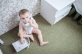 Cute baby boy with telephone