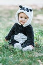 Cute baby boy wearing a Panda bear suit Royalty Free Stock Photo