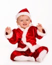 Cute baby dressed as Santa Claus