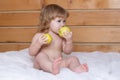 Cute baby eat apple. Funny baby eat apples. Kid eating fruit. Healthy nutrition for kids. Solid food for infant. Royalty Free Stock Photo