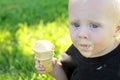 Cute Baby Eating Ice Cream Cone Royalty Free Stock Photo