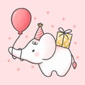 Cute baby elephant in a birthday party hat holding balloon and gift box Royalty Free Stock Photo