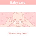 Cute baby face. Hands apply creme o baby skin.