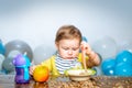 Cute baby food, babies eating. Funny kid boy with plate and spoon. Royalty Free Stock Photo