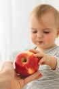 Cute baby girl with apple Royalty Free Stock Photo