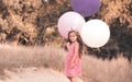 Cute baby girl with balloons outdoors Royalty Free Stock Photo