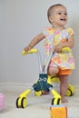 Cute baby girl and bicycle