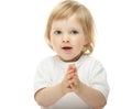 Cute baby girl clapping her hands Royalty Free Stock Photo