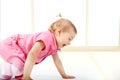 Cute baby girl crawling Royalty Free Stock Photo