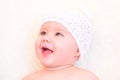 Cute Baby Girl Laughing and Wearing a Soft Knit Bear Ears Hat Royalty Free Stock Photo