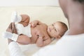 Cute Baby Girl Lying in the Crib Royalty Free Stock Photo