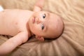 Cute baby girl lying on her back Royalty Free Stock Photo