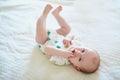 Cute baby girl lying on her back Royalty Free Stock Photo