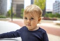 Cute baby girl outdoors in a park Royalty Free Stock Photo