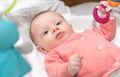 Cute baby girl playing with playmat toys Royalty Free Stock Photo