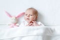 Cute baby girl playing with plush animal toy Royalty Free Stock Photo