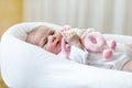 Cute baby girl playing with plush animal toy Royalty Free Stock Photo