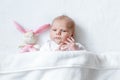 Cute baby girl playing with plush animal toy Royalty Free Stock Photo