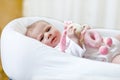 Cute baby girl playing with plush animal toy Royalty Free Stock Photo