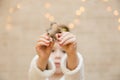 Cute baby girl is preparing in Christmas kitchen. Funny little girl is having fun with cookie cutters.Children chef concept.Happy Royalty Free Stock Photo