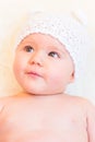 Cute Baby Girl Smiling and Wearing a Soft Knit Bear Ears Hat Royalty Free Stock Photo