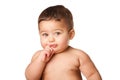 Cute baby infant with big green eyes finger in mouth on white Royalty Free Stock Photo