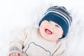 Cute baby in a knitted hat and sweater Royalty Free Stock Photo