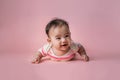 Baby laying on her belly in studio Royalty Free Stock Photo