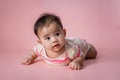 Baby laying on her belly in studio Royalty Free Stock Photo