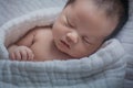 Cute baby lying on bath towel just after bath