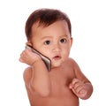 Cute baby make a phone call Royalty Free Stock Photo